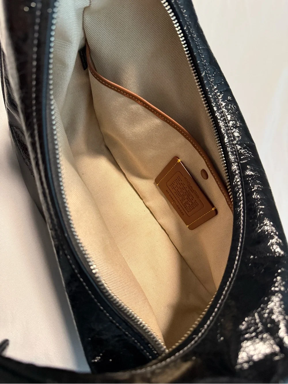 Coach shiny black
